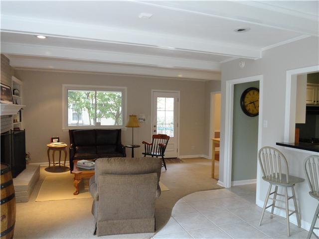 192 North Rose Road Memphis, TN 38117 - Photo 10 of 25 This view of the Den shows the opening to the Kitchen, the Dining Room and outdoors.