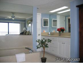 7780 A1A South, Unit 202 St. Augustine, FL 32080 - Photo 4 of 12 master bedroom suite