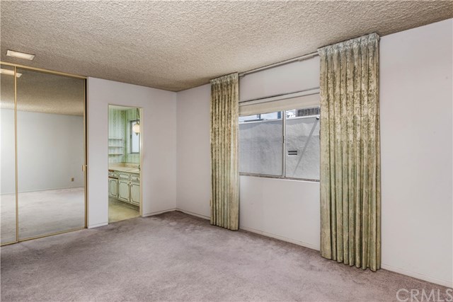 2101 2nd Street, Unit 203 Long Beach, CA 90803 - Photo 15 of 22 Master Bedroom with view of bathroom