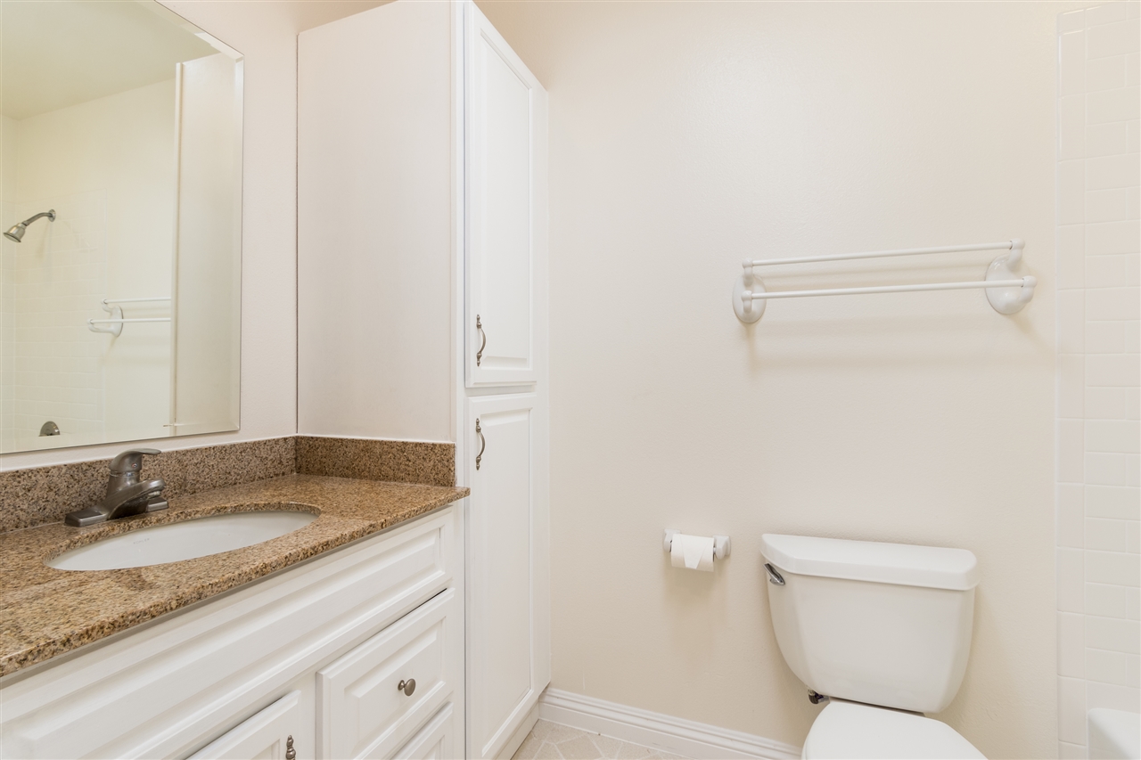 10312 Molino Road Santee, CA 92071 - Photo 23 of 25 Hall bathroom has granite counters and a new mirror.