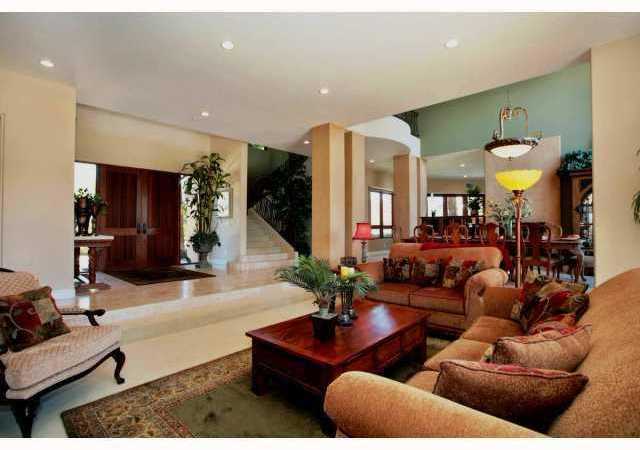 3420 Adams Run Encinitas, CA 92024 - Photo 7 of 25 Mahogany front doors and custom wrought iron staircase.
