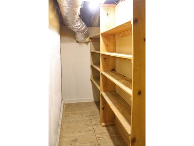 403 12 Oaks Circle Memphis, TN 38117 - Photo 20 of 25 Another storage closet in the extra room has shelves...a perfect 'Sams' room or 'Costco' room!