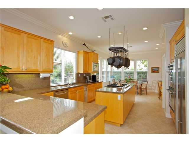 5255 Greenwillow Lane San Diego, CA 92130 - Photo 10 of 25 Gourmet Kitchen with Stainless Steel Appliances including Sub-Zero Refrigerator and Island with 6 burner gas cooktop