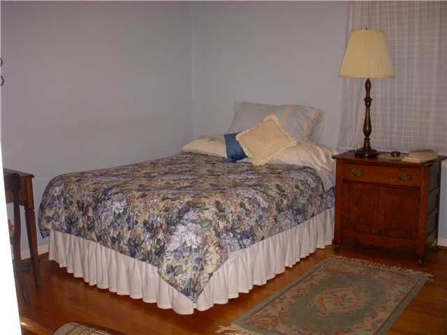 3549 McCorkle Road Memphis, TN 38116 - Photo 16 of 25 Second bedroom is large and bright with 2 windows and good size closet. Look at those hardwood floors.