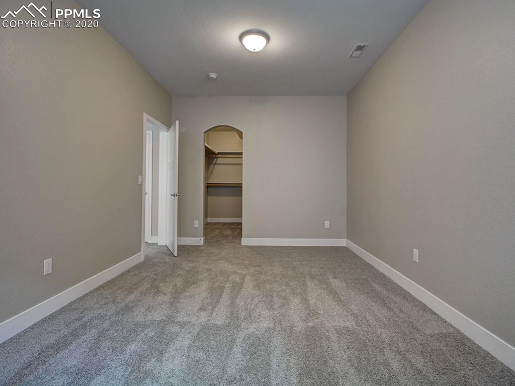208 Custer Avenue Colorado Springs, CO 80903 - Photo 32 of 36 Large basement bedroom with walk-in closet