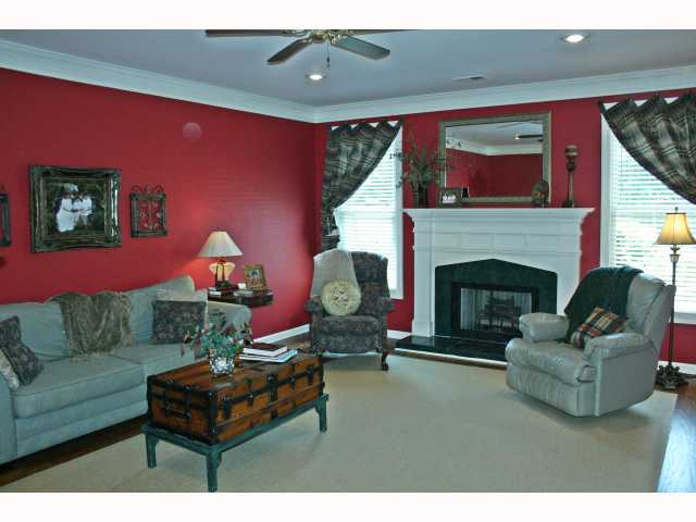 745 Coleherne Road Collierville, TN 38017 - Photo 12 of 12 Notice gleaming hardwood flooring recently refinished! This 20x15 great rm is perfect for your family. It features a custom mantle and fireplace w/ cozy gas logs perfect for that relaxing evening. Home features an open floorplan perfect for entertaining.
