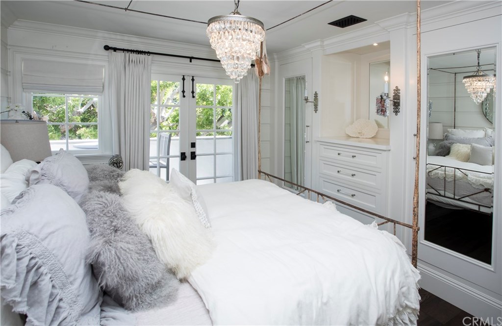 326 Ruby Street Laguna Beach, CA 92651 - Photo 17 of 20 Bedroom with Built-ins, French Doors, and Small Balcony.