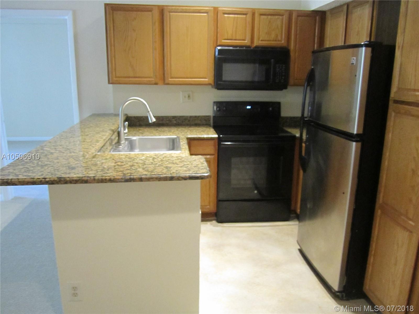 831 Lyons Road, Unit 23205 Coconut Creek, FL 33063 - Photo 3 of 21