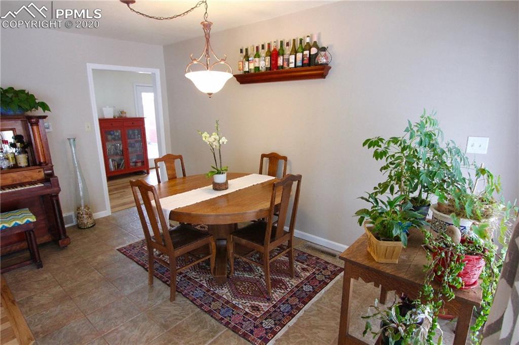 210 Crystal Park Road Manitou Springs, CO 80829 - Photo 4 of 34 Tiled Dining Area, View into Kitchen