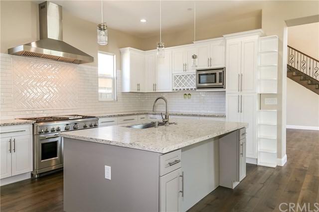 14221 Hammon Place Westminster, CA 92683 - Photo 38 of 52 Kitchen Island and Pantry.