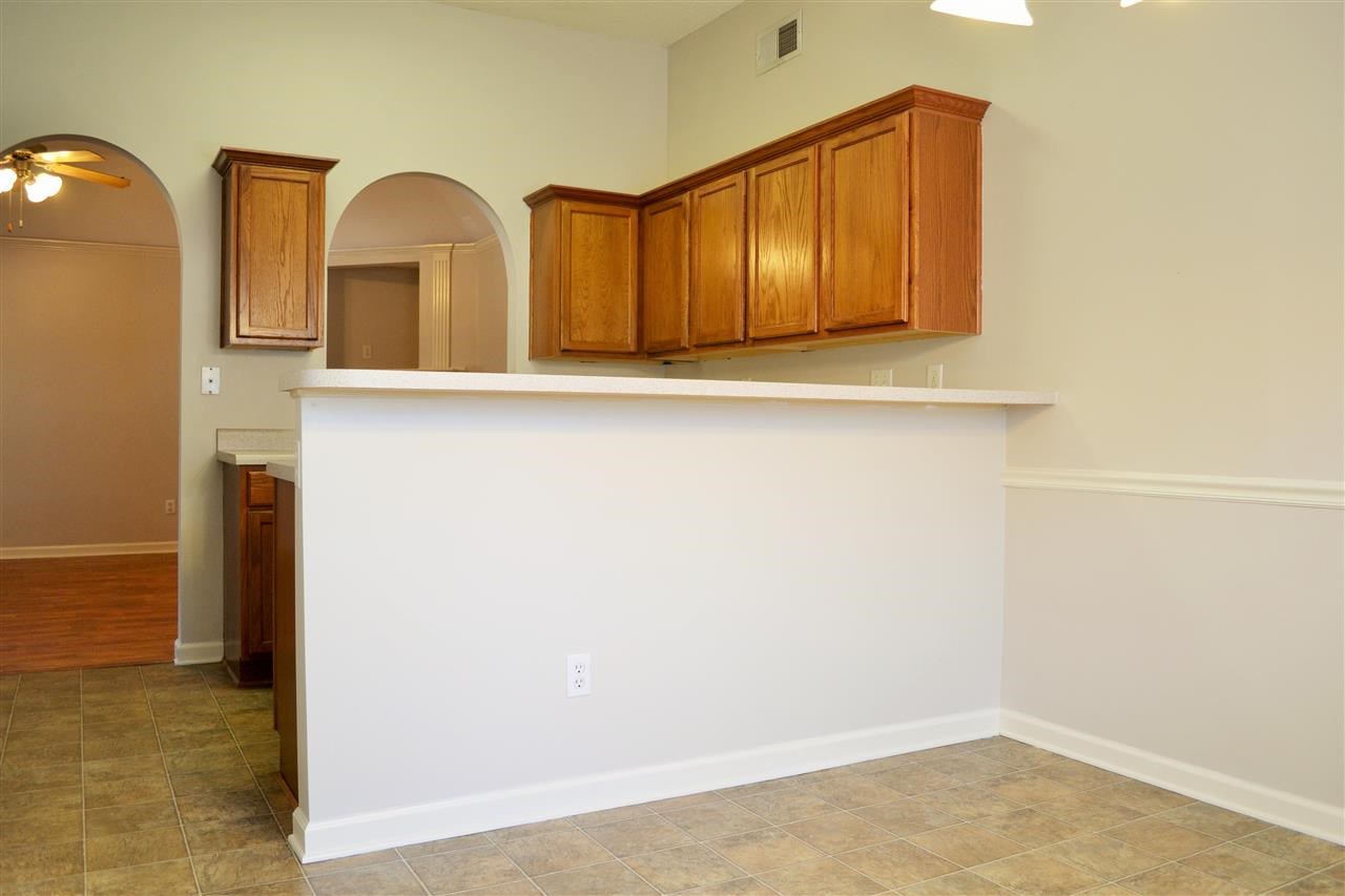 10072 Cross Ridge Road Cordova, TN 38018 - Photo 9 of 25 View the breakfast bar & kitchen cut out so the cook can easily stay involved with whats happening in the living room. :)