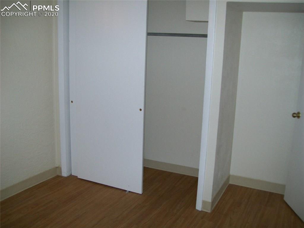 612 Sunset Road Colorado Springs, CO 80909 - Photo 13 of 27 Basement level 3rd Bedroom