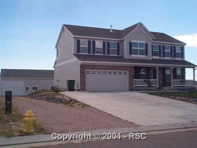 7991 Buschborn Road Peyton, CO 80831 - Photo 1 of 6 Gallery Image 1