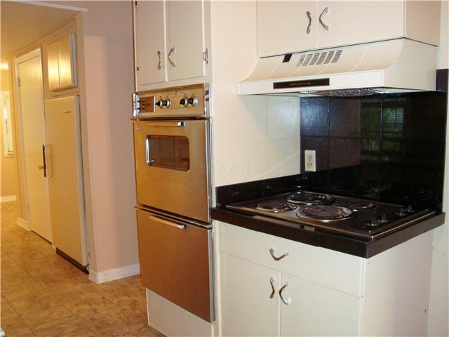 1640 Marcia Road Memphis, TN 38117 - Photo 5 of 12 Double ovens, cook top and upright freezer in kitchen