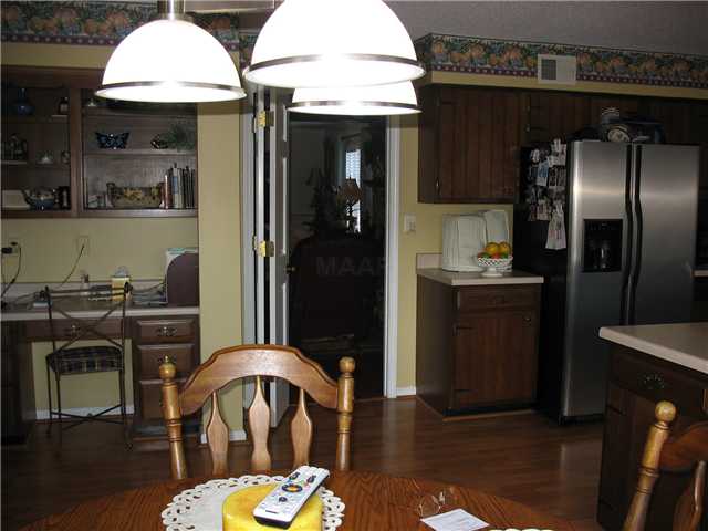 8686 Jack Bond Road Arlington, TN 38002 - Photo 11 of 22 Lots of room in this kitchen! Has a built in desk plus .