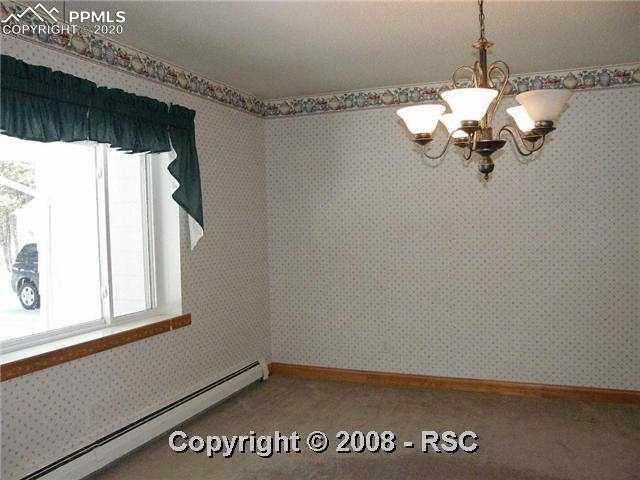 11910 Windmill Road Colorado Springs, CO 80908 - Photo 9 of 14 Formal Dining Room