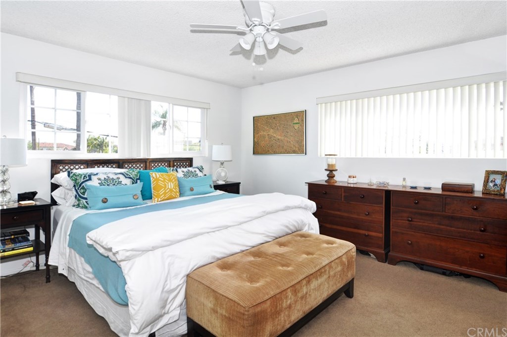 253 17th Street Seal Beach, CA 90740 - Photo 12 of 36 A perfectly bright and generously spaced bedroom with a ceiling fan to circulate the beach breezes.