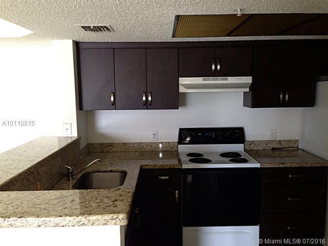 5061 Wiles Road, Unit 102 Coconut Creek, FL 33073 - Photo 3 of 10