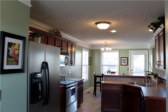 736 Winding Bluff Way Clarksville, TN 37040 - Photo 7 of 16 Fabulous Kitchen with an Extra Pantry, a Serving Bar, Custom Cabinets and Matching Appliances