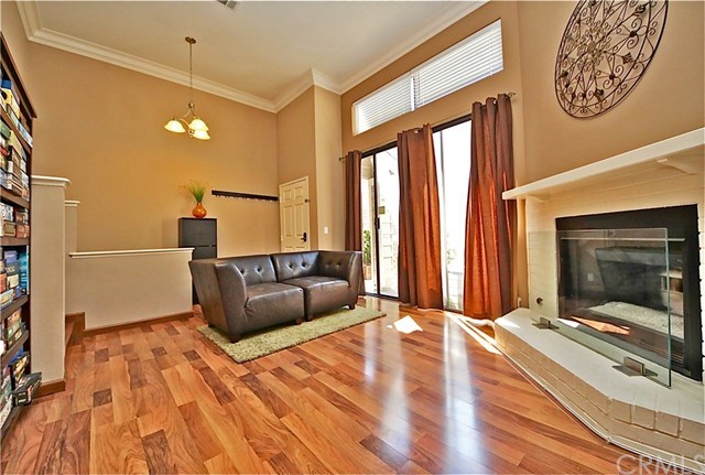 1208 Mayflower Avenue, Unit C Monrovia, CA 91016 - Photo 11 of 47 Crown moulding and sliding glass door to the patio