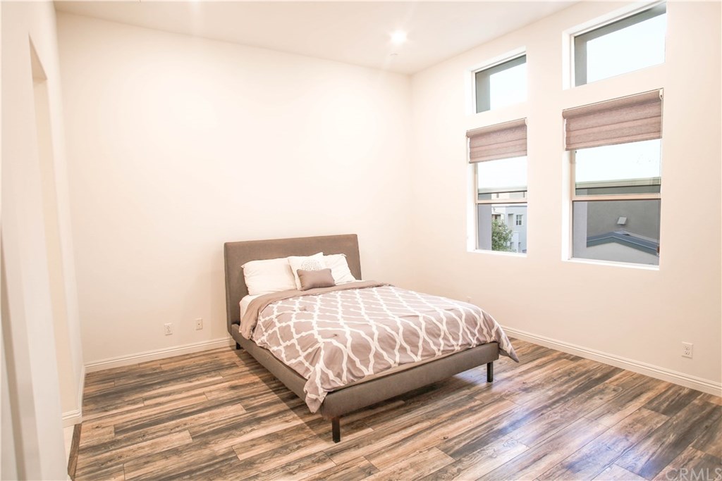 112 Acamar Irvine, CA 92618 - Photo 5 of 14 Master Bedroom With Walk-In Closet and En Suite Master Bath