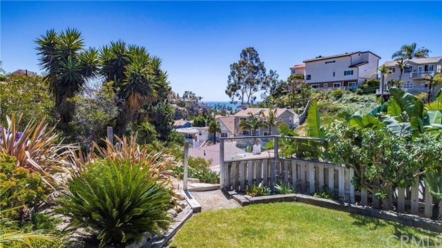 34096 El Contento Dana Point, CA 92629 - Photo 6 of 43 Truly a rare and amazing opportunity to own a quintessential Lantern Village beach bungalow situated atop one of the largest LOTS in the area with OCEAN and Whitewater vistas!