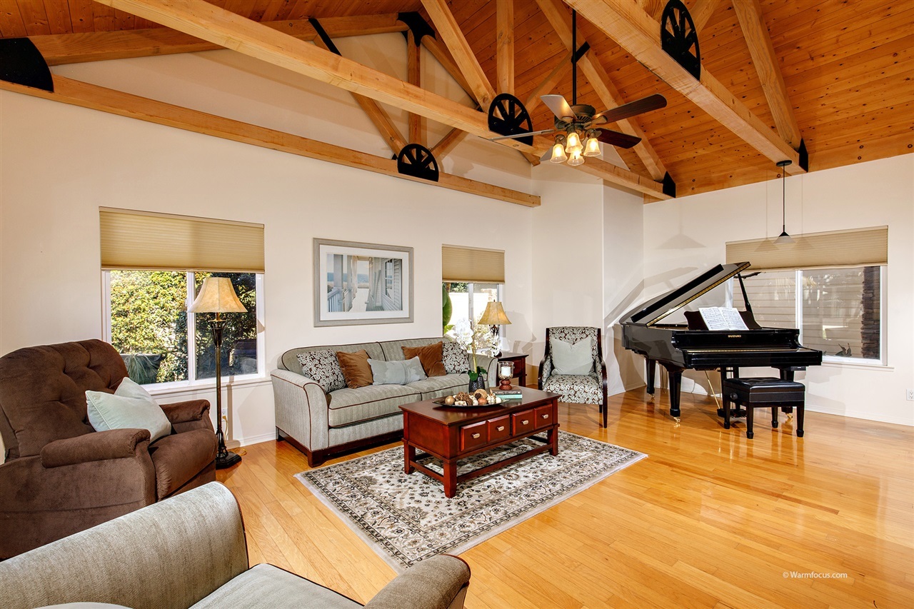 449 Ocean View Avenue Encinitas, CA 92024 - Photo 5 of 23 Wood floors and exposed beam ceiling in living room