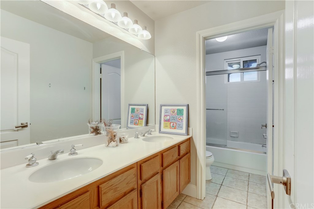 6 Via Colorso San Clemente, CA 92672 - Photo 16 of 32 Upstairs bathroom holds a bathtub, shower, and dual sinks!