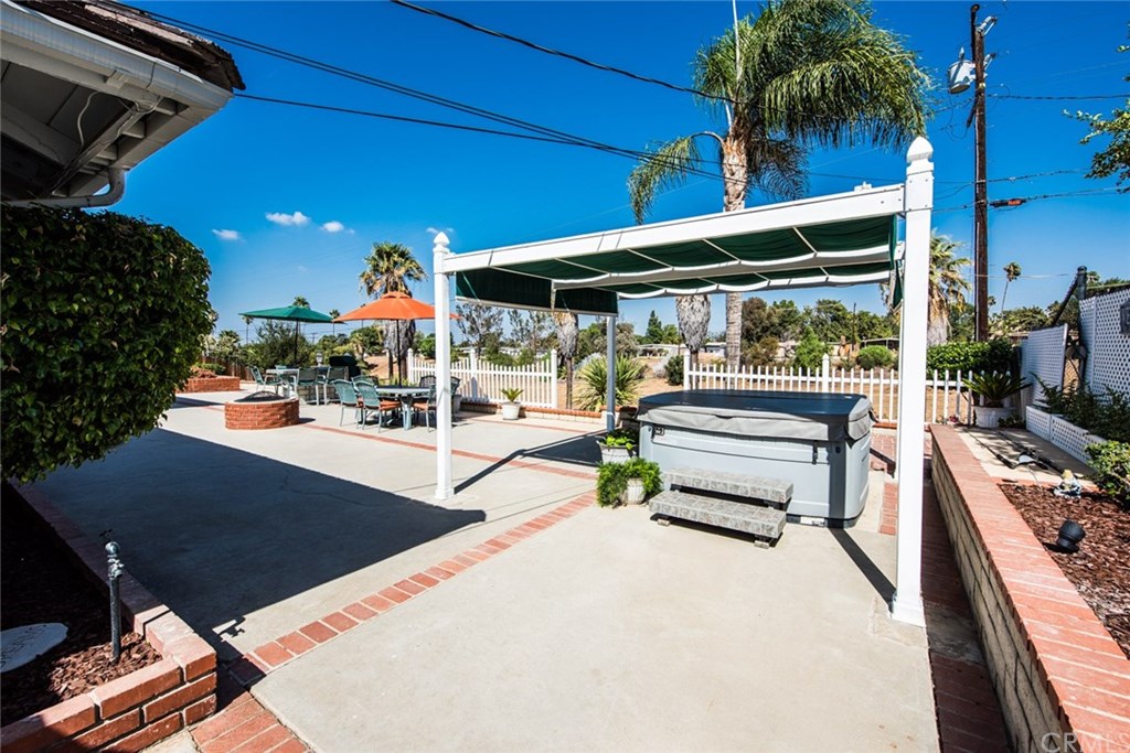 2001 Cypress Point Drive Corona, CA 92882 - Photo 46 of 62 Patio cover over spa includes retractable shades