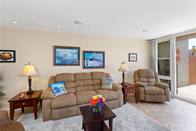 4002 Aladdin Drive Huntington Beach, CA 92649 - Photo 13 of 55 Notice the new windows and glass slider on your right as you exit onto your private patio!