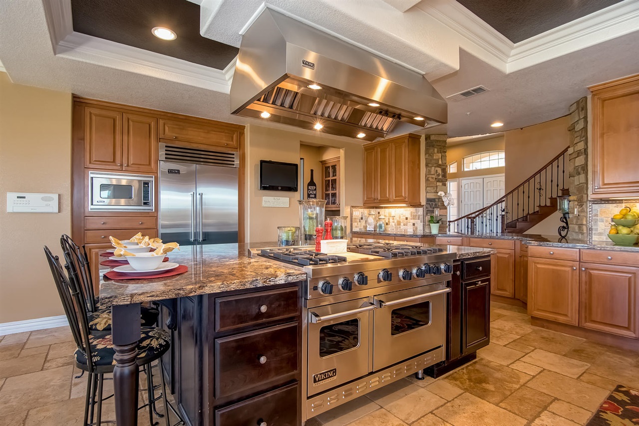 512 Latigo Row Encinitas, CA 92024 - Photo 7 of 25 Professionally equipped kitchen has all the amenities including Viking appliances.