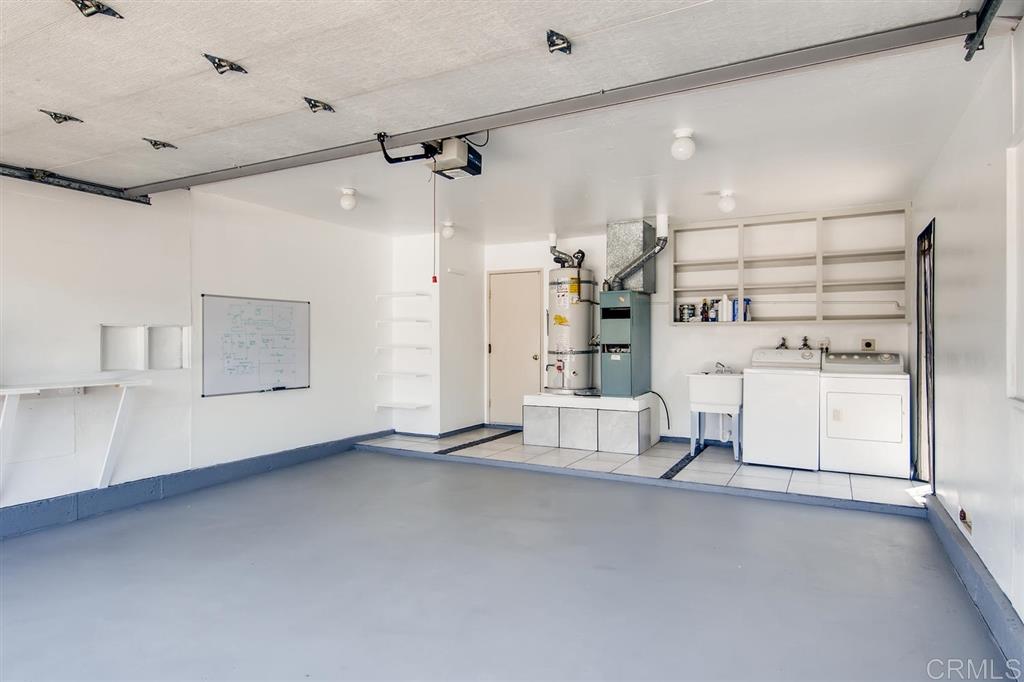 3101 Segovia Way Carlsbad, CA 92009 - Photo 13 of 14 Squeky clean, seperate area for washer dryer has a raised concrete and tiled.
