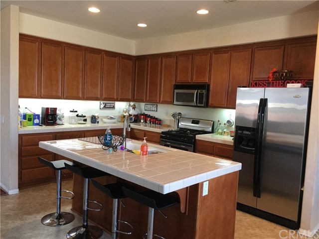 692 Apache Street San Jacinto, CA 92582 - Photo 9 of 36 Kitchen with lots of cabinet spaces