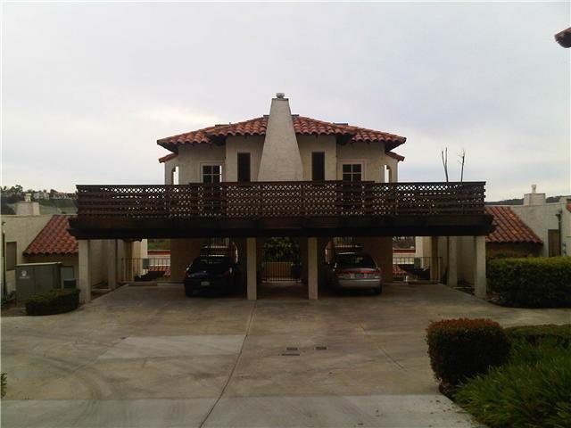 2355 Caringa Way, Unit 4 Carlsbad, CA 92009 - Photo 25 of 25 Driveway leading to unit, clubhouse and pool.