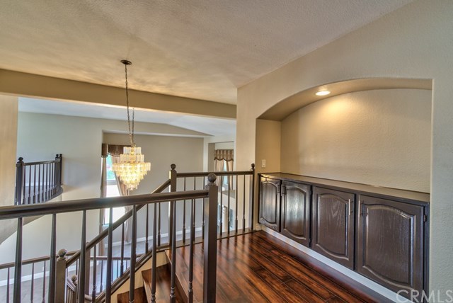 3086 Diamondview Circle Corona, CA 92882 - Photo 40 of 66 partial view of the upper hall. All the cabinets throughout the house and the staircase were just re-stained.