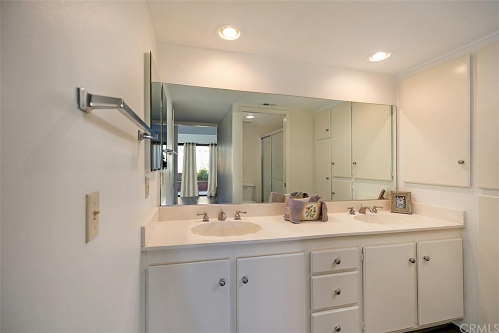 5001 Paseo Dali Irvine, CA 92603 - Photo 9 of 14 Master Bathroom with tons of closet storage cabinet
