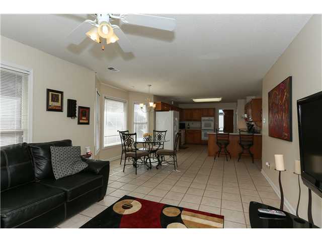 286 North Ericson Road Memphis, TN 38018 - Photo 12 of 22 Relax in your Family room convenient to the Kitchen with a view of the Patio and Backyard. Lovely indoor and outdoor living spaces.
