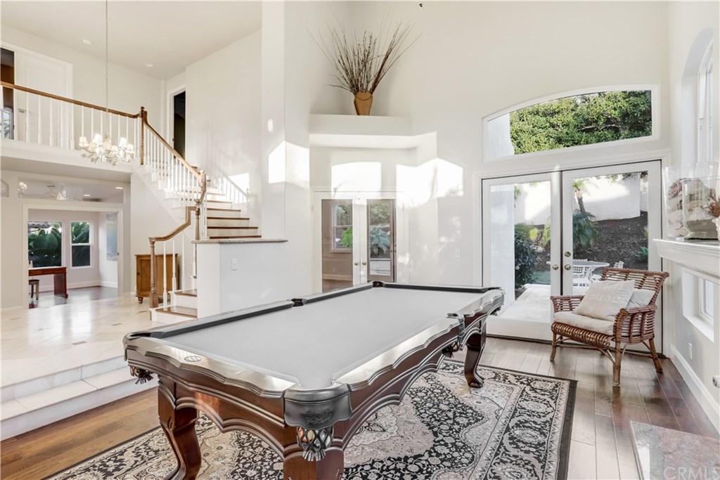6 Via Colorso San Clemente, CA 92672 - Photo 4 of 32 Tile and hardwood flooring, step down into the sunken front room, which would be a nice sitting space, or a game room!