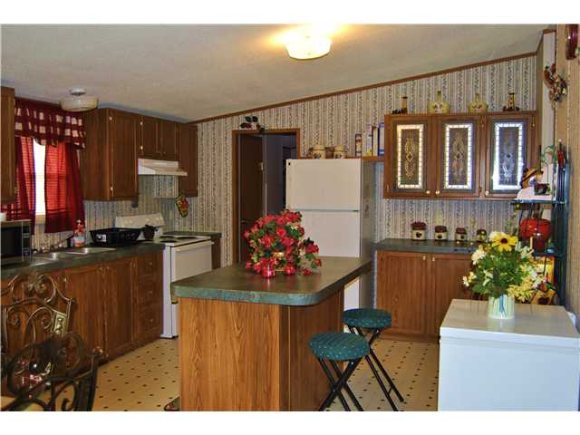 478 Griffin Road Mason, TN 38049 - Photo 4 of 12 Island in Kitchen , Plenty of Cabinet & Counter Top Space.