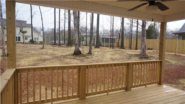 72 Pine Ridge Clarksville, TN 37040 - Photo 25 of 30 Covered deck with ceiling fan on back of home