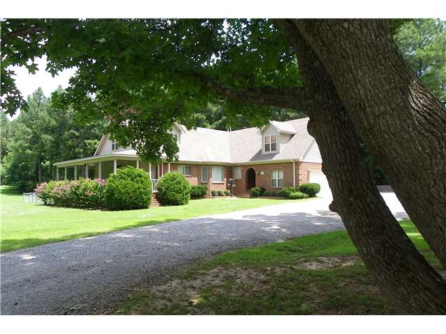3910 Chambers Road Millington, TN 38053 - Photo 1 of 24 Notice the country covered porch on the left.