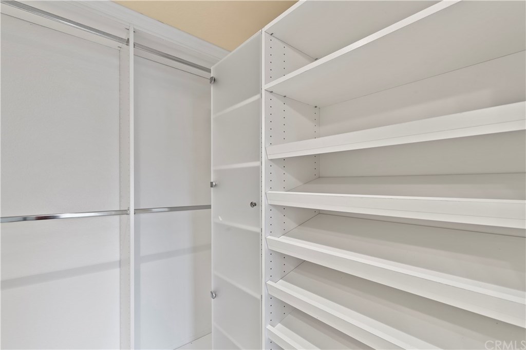16 Flores Lake Forest, CA 92610 - Photo 19 of 24 Only part of the professionally organized master suite closet.