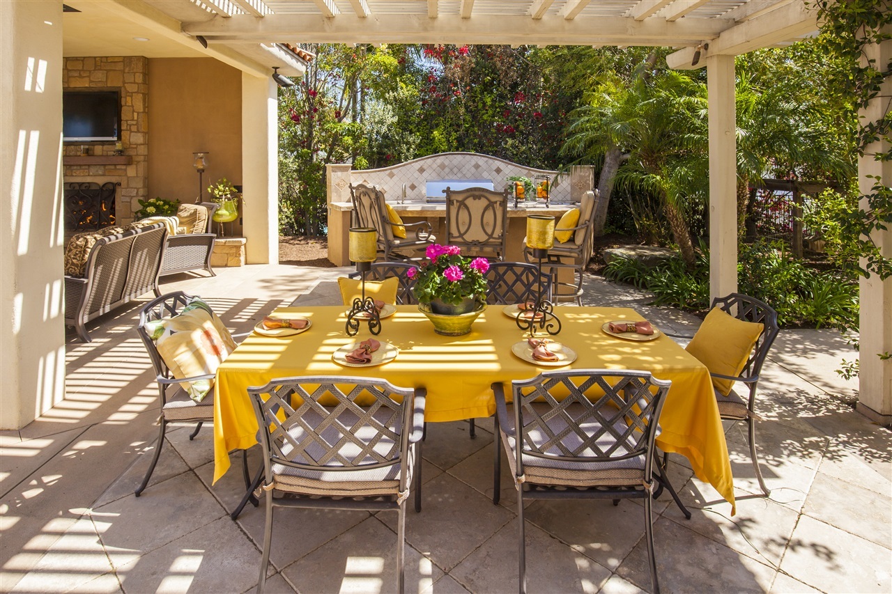 6802 Farms View Court Rancho Santa Fe, CA 92067 - Photo 23 of 25 Imagine celebrations around this table while grilling on the outdoor kitchen, plucking fresh fruit from your family grove. Paradise!