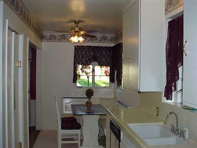 1728 Locust Ravine Bakersfield, CA 93306 - Photo 4 of 5 Great Kitchen w/corner booth Eating area.