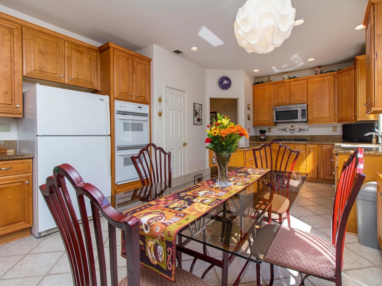 6047 Piros Way Oceanside, CA 92056 - Photo 10 of 25 The Kitchen is a chef’s dream and has been remodeled with upgraded cabinetry. There is even a pantry and double ovens which works perfect for storing and cooking a large meal.