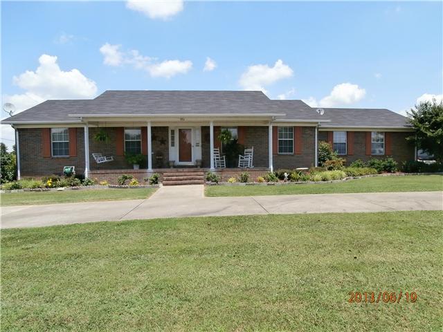 390 Smith Mill Road Fayetteville, TN 37334 - Photo 21 of 21 FRONT OF HOME WITH CIRCLE DRIVE AND LARGE PORCH WELCOMES GUESTS