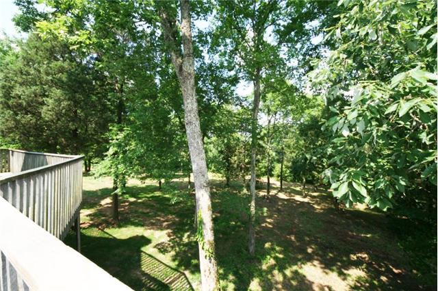 2308 West Trimble Road Milton, TN 37118 - Photo 25 of 30 A VIEW OF THE LARGE BACK YARD FROM THE WRAP AROUND DECK! SOME TREES RECENTLY REMOVED FOR BETTER VIEW! 2308 W TRIMBLE ROAD, MILTON, TN, 37118!