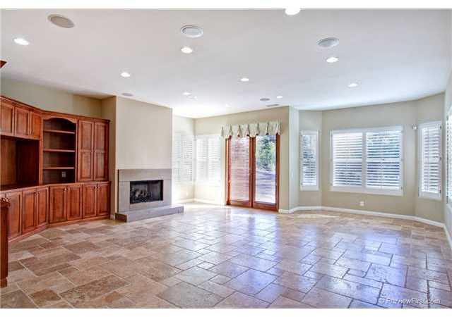 14339 Blue Sage Road Poway, CA 92064 - Photo 8 of 20 Spacious Family room with Breakfast area. Custom Built ins