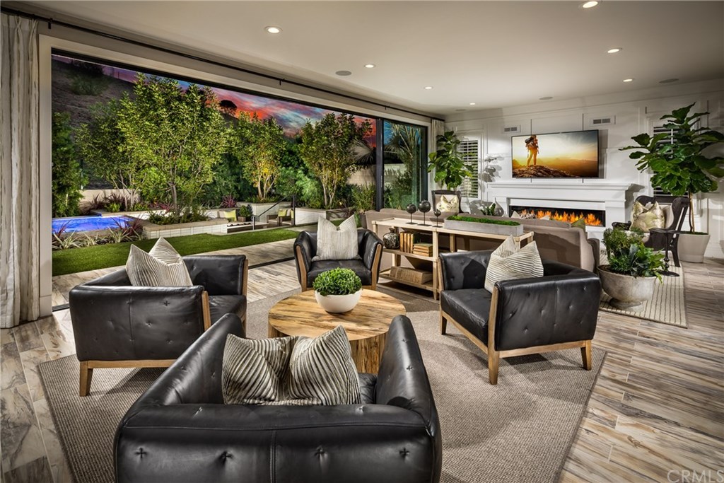 61 Buttonquail Irvine, CA 92618 - Photo 6 of 15 Great Room. Photo of model home not actual home for sale.