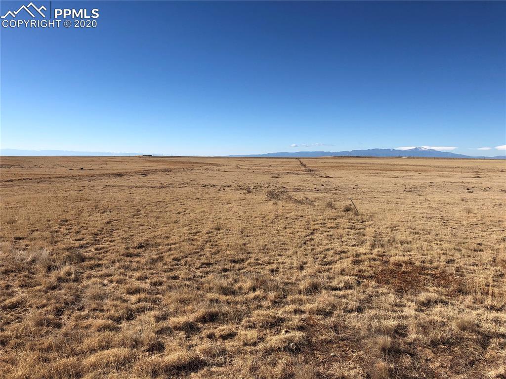 12290 South Lauppe Road Yoder, CO 80864 - Photo 4 of 7 NE corner looking West. Pikes Peak on the right and Sangre de Cristo mountain range to the left.